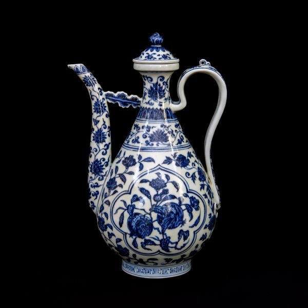 Ming Yongle blue and white ewer and cover with panels of detached floral and fruit sprays