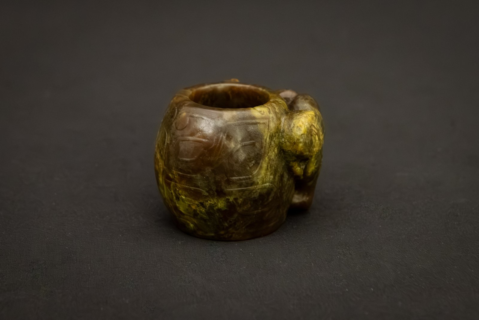 Shang Dynasty Jade Archer’s Ring with Sheep Head China, c. 16th–11th century BC. - Image 3