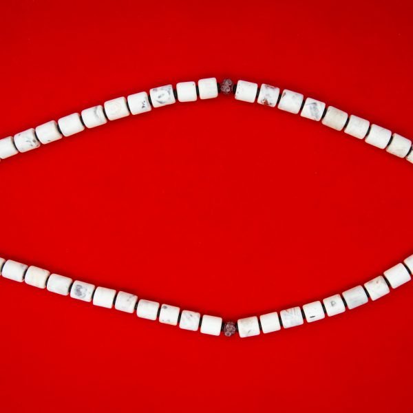 Liangzhu culture and featuring chicken bone jade tones.